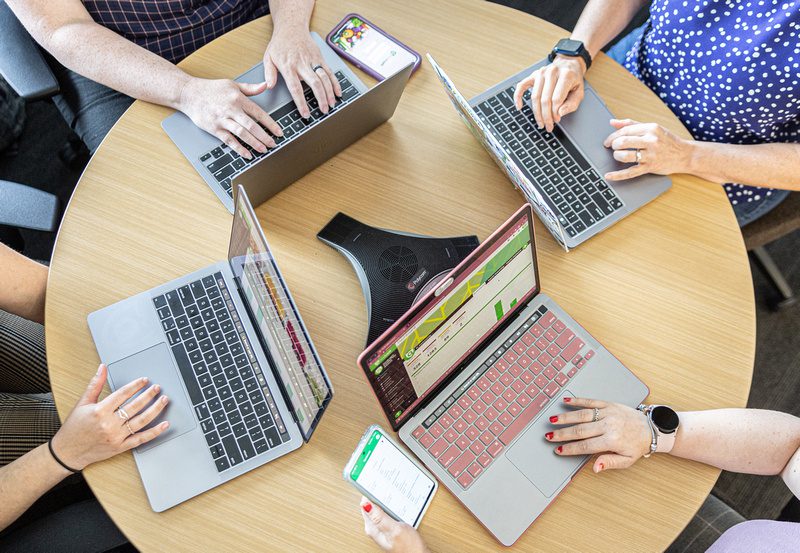 Group of team members using computers